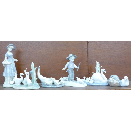 605 - Six figures including Lladro, Nao, German, boy figure a/f