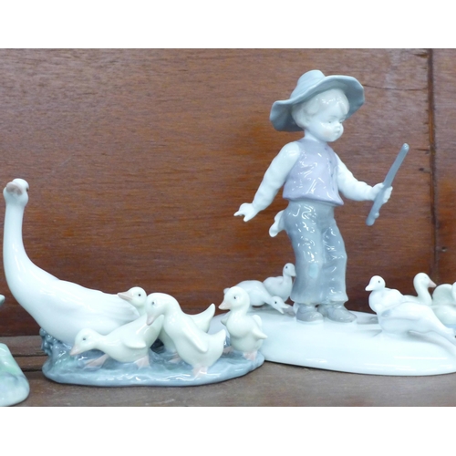 605 - Six figures including Lladro, Nao, German, boy figure a/f