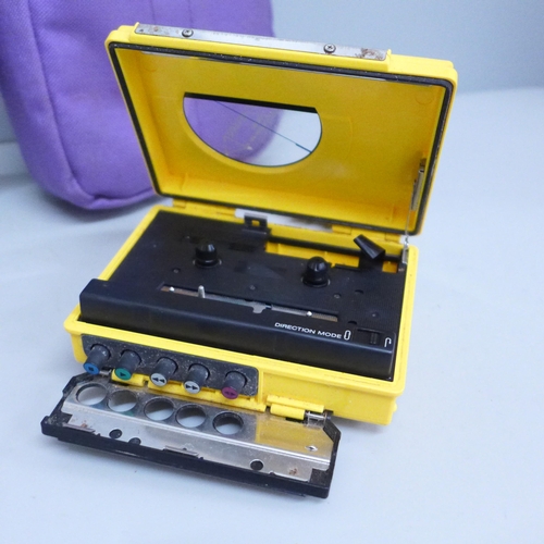 619 - A 1980’s yellow Sony Sports Walkman WM-75, battery operated, complete with matching headphones in pa... 