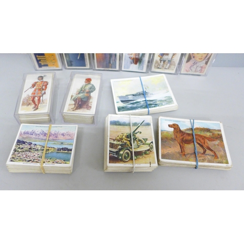 622 - Cigarette cards; twelve sets of cigarette cards including Carreras (History of Naval Uniforms, Histo... 