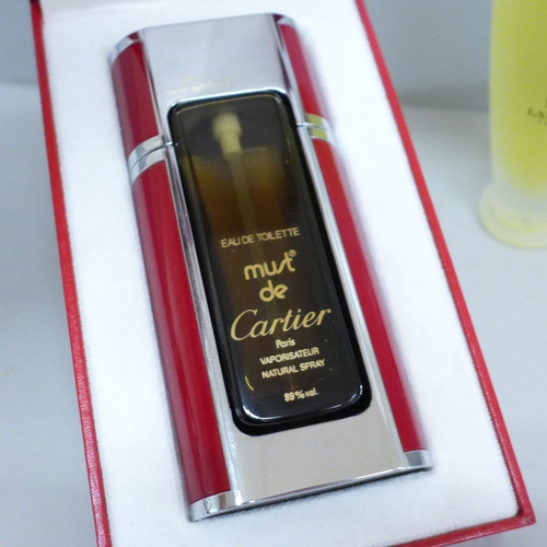 635 - A Must de Cartier Paris refillable scent bottle, (no contents), a Lanvin display bottle and a French... 