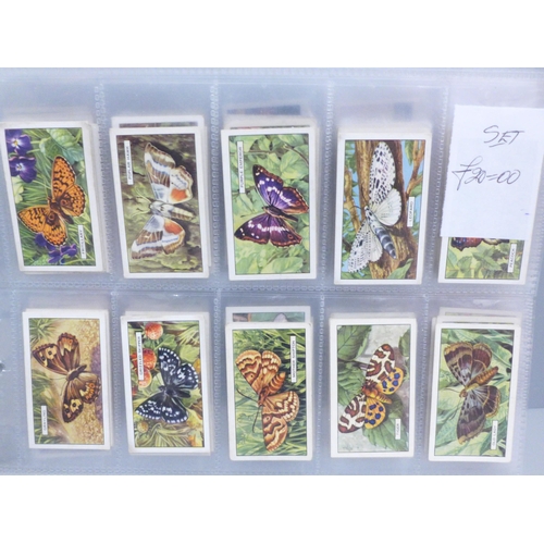 636 - Cigarette cards; eleven complete sets, mainly Players & Wills, including birds, butteflies, football... 