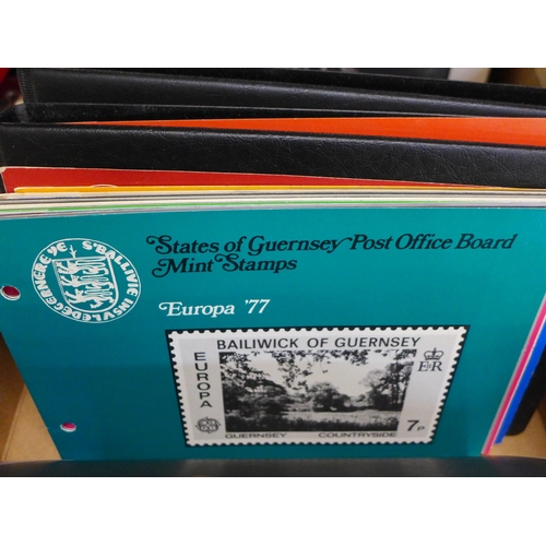 646 - Stamps; a box of Channel Islands presentation packs