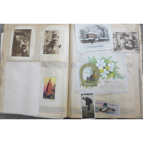 661 - A Port Sunlight album containing Victorian scraps, cards, etc.