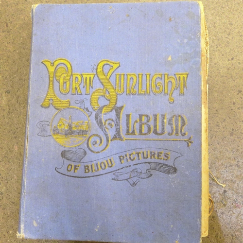 661 - A Port Sunlight album containing Victorian scraps, cards, etc.