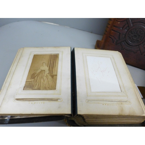 664 - Three Cartes-de-visites albums, one with portraits, one larger part full and one empty