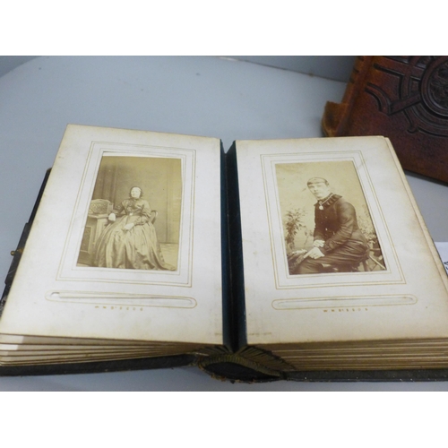 664 - Three Cartes-de-visites albums, one with portraits, one larger part full and one empty