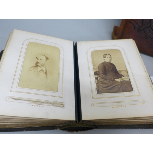 664 - Three Cartes-de-visites albums, one with portraits, one larger part full and one empty