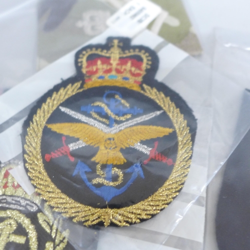 666A - A large collection of military patches, cap badges, etc.