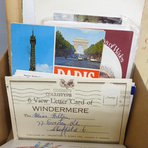 687 - A box of paper ephemera, maps, Vimto book, etc.