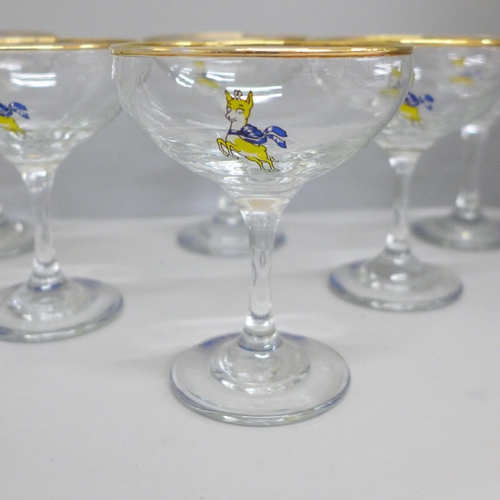 688 - Two sets of six drinking glasses including Babycham