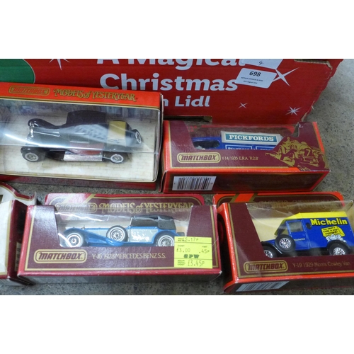 698 - A box of die-cast vehicles including Days Gone, Models of Yesteryear and Matchbox, (34)