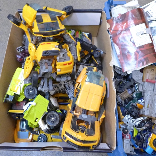 711 - Two boxes of Transformers, some with instructions