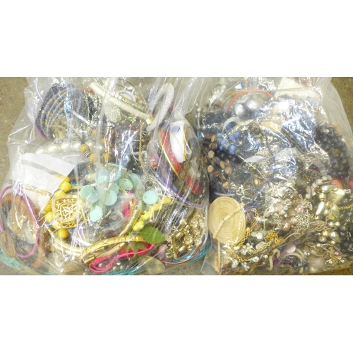 712 - Two bags of costume jewellery