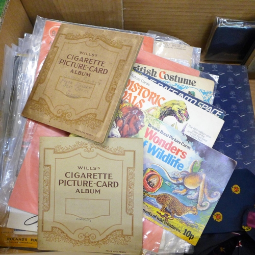 715 - Assorted items, records, sheet music, bibles, cigarette and tea cards, postcards, sweetheart handker... 