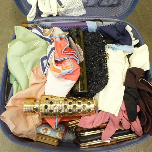 717 - Silk scarves, stockings, handbags, purses, gloves, etc.