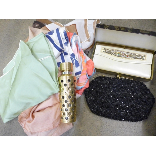 717 - Silk scarves, stockings, handbags, purses, gloves, etc.