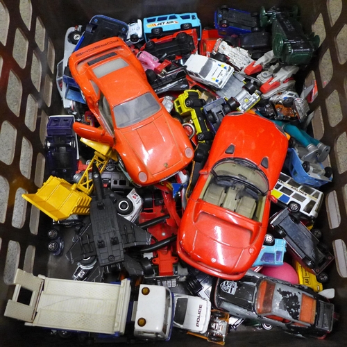 718 - A collection of die-cast model vehicles and a collection of toy figures