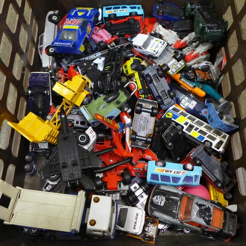 718 - A collection of die-cast model vehicles and a collection of toy figures