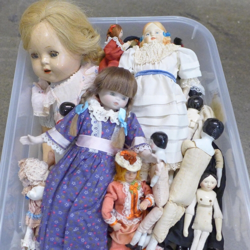 740 - A collection of vintage dolls including wax and bisque and two boxed 'Doll Kits'