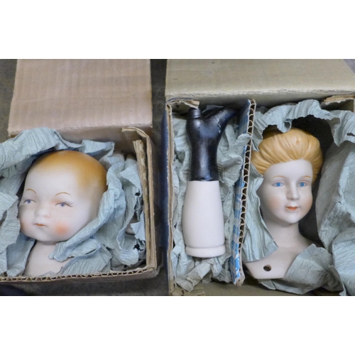 740 - A collection of vintage dolls including wax and bisque and two boxed 'Doll Kits'