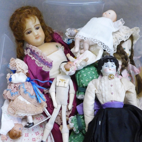 740 - A collection of vintage dolls including wax and bisque and two boxed 'Doll Kits'