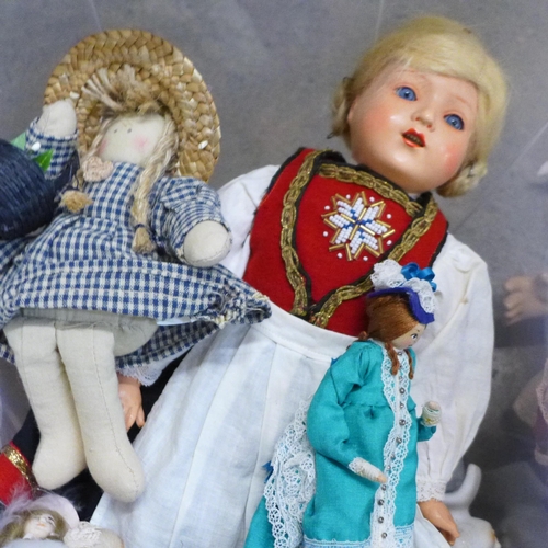 740 - A collection of vintage dolls including wax and bisque and two boxed 'Doll Kits'