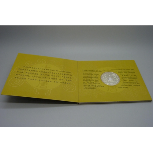 823 - 'The Tang Dynasty' silver coin, one ounce of fine silver, 1998