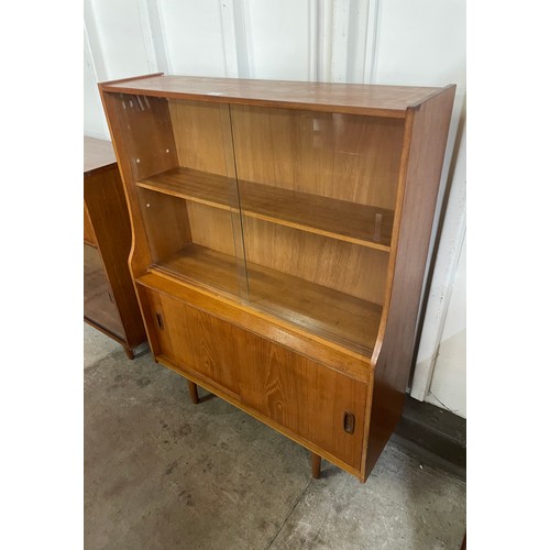 28 - A teak bookcase