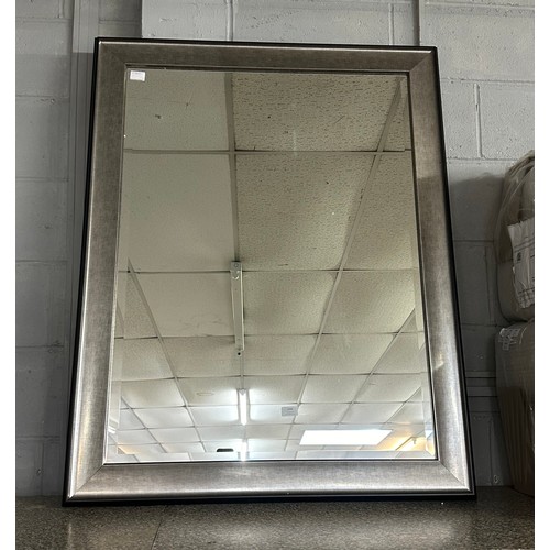 1436 - A silver framed mirror