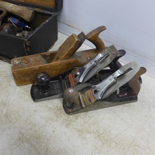 2016 - A Wooden toolbox containing an assortment of hand tools including hand drill, brace drill, hatchet a... 