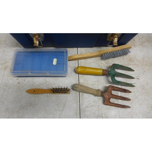 2027 - A toolbox with various hand tools including brushes, garden forks, shovels, wrenches, etc.