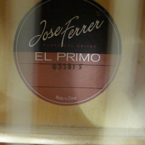 2050 - A Jose Ferrer El Primo 055815 classical acoustic guitar, one other acoustic guitar and a TGI soft gu... 