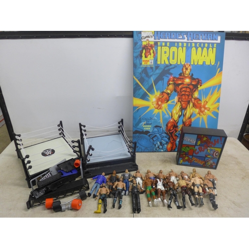 2051 - 19 WWE figures, 2 WWE rings, a Marvel light box and an Ironman poster