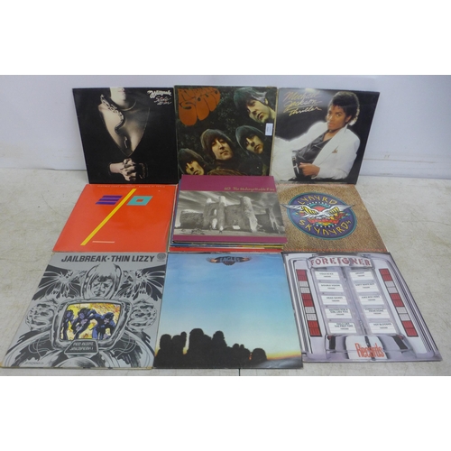 2052 - 18 assorted Lp records including The Beatles, Michael Jackson, Lynard Skynrd, Foreigner, Eagles, ELO... 