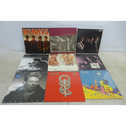 2052 - 18 assorted Lp records including The Beatles, Michael Jackson, Lynard Skynrd, Foreigner, Eagles, ELO... 