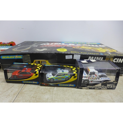 2053 - A selection of Scalextric items including a Ford Focus Police car with flashing lights and a siren, ... 