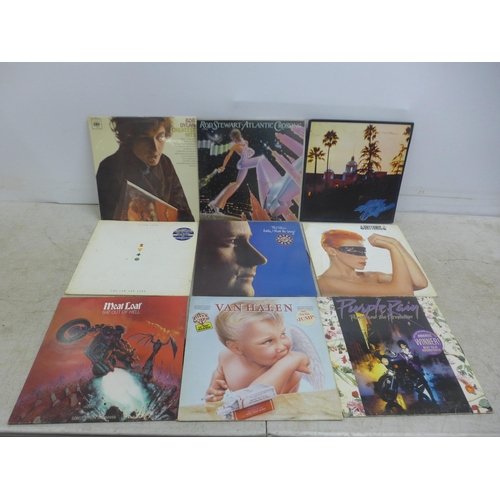 2054 - 17 assorted LP records including Elton John, Eurythmics, Eagles, ZZ Top, Phil Collins, Prince, Etc.