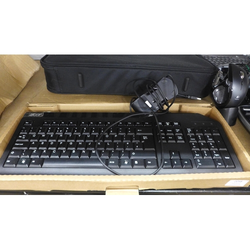 2058 - A quantity of PC keyboards and mice including a Microsoft Natural Wireless Ergonomic keyboard 7000 a... 