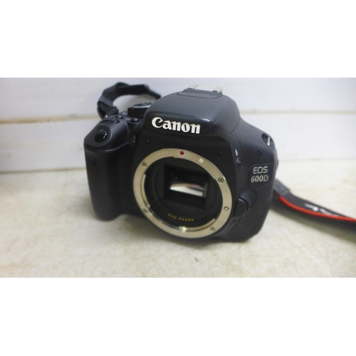 2072 - A Cannon EO5 600D digital camera with assorted lens and tripods and bag