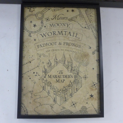 2077C - Two Harry Potter themed prints in frames