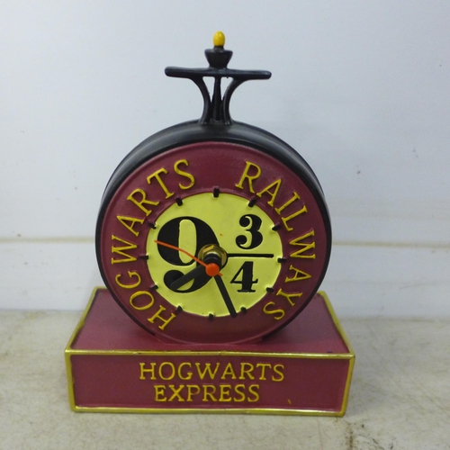 2077D - Three Harry Potter themed items, money bank, clock and 3D puzzle