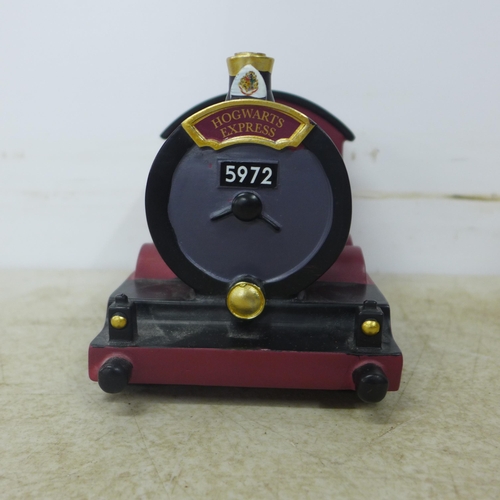 2077D - Three Harry Potter themed items, money bank, clock and 3D puzzle