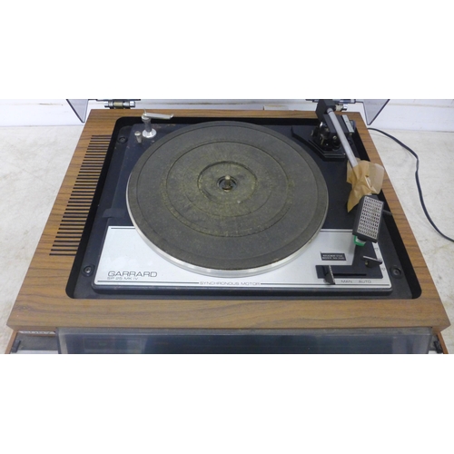 2108 - A Garrard SP 25 MK IV synchronous motor HMP-40 stereo music system with turntable record player and ... 