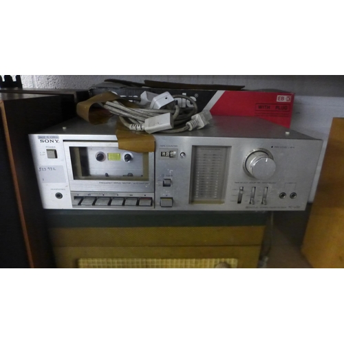 2110 - A Sony TC-U30 stereo cassette deck, a pair of Sony SS-40A stereo speakers, a Panasonic RX-FS430 ster... 