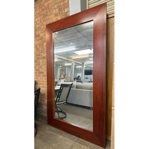 1449 - A large hardwood framed mirror