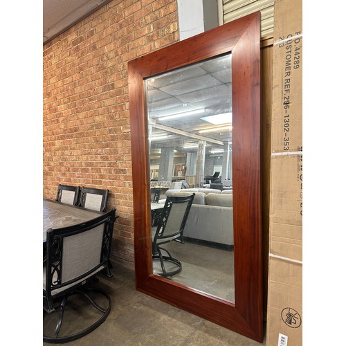 1449 - A large hardwood framed mirror