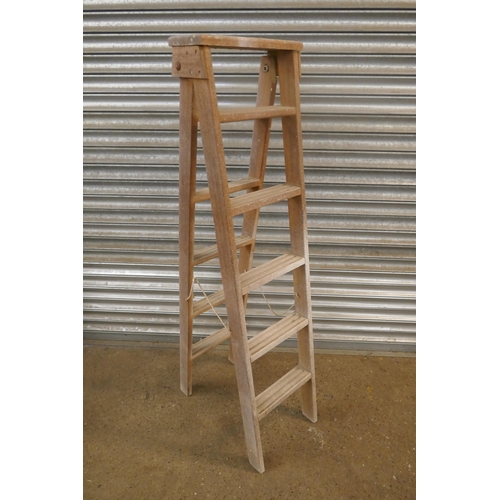 2160 - A set of 6 rung wooden step ladders and a set of 5 rung wooden step ladders