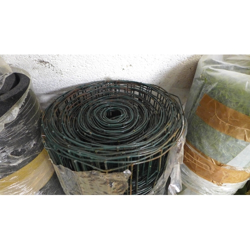 2185 - A roll of artificial grass, a roll of metal fencing and a roll of rubber matting