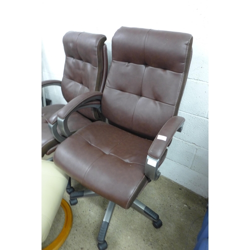 2197 - Two leather effect office swivel chairs and a leather effect footstool